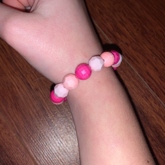 I am selling this bracelet it is pink and white and is $5.00 - Picture 2 of 2